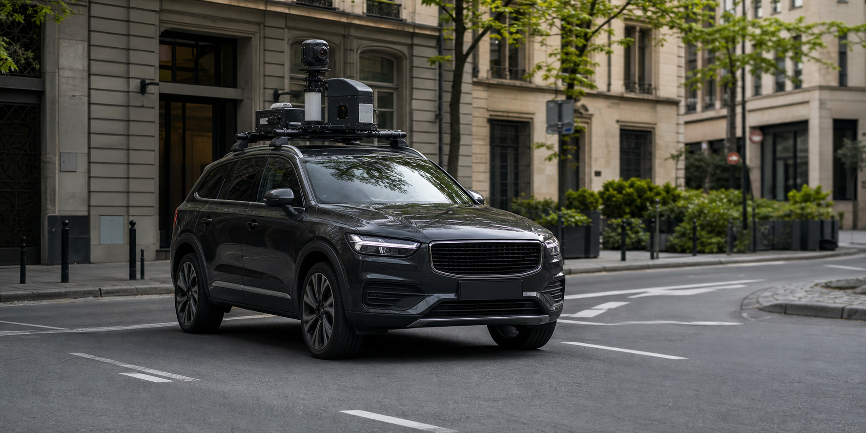 Survey vehicle fitted with a 360-degree mobile mapping sensor array on a European city street